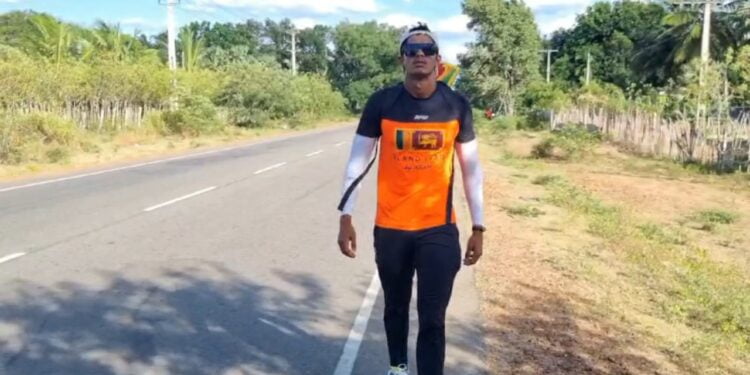 சமூக நலன் கருதி இலங்கையை சுற்றி நடைபவனி வரும் இளைஞன்.